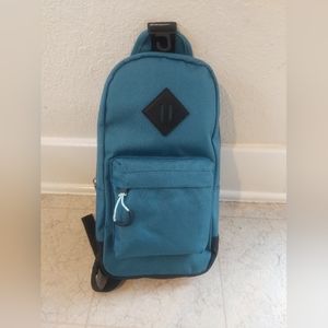 No Boundaries sling backpack teal green